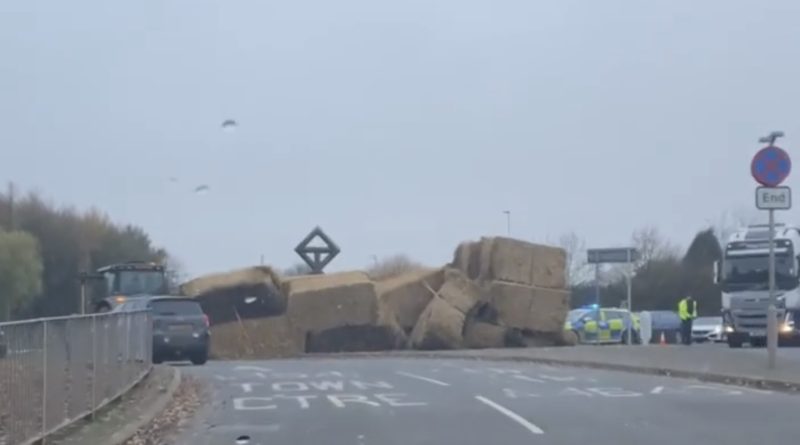 Tractor sheds load